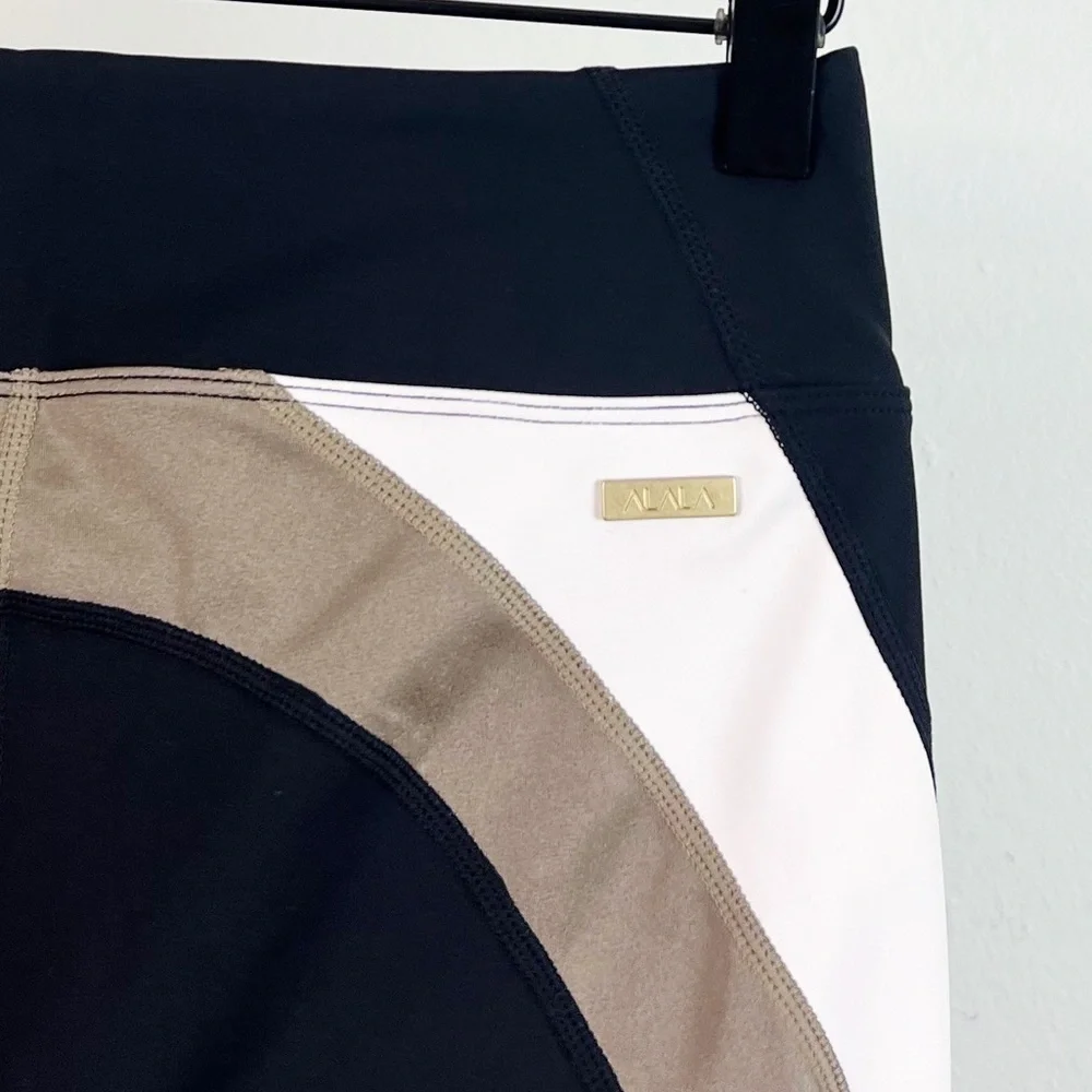 NWT Alala Bolt High Rise Bike Shorts Black/Gold/Bone - Picture 8 of 8